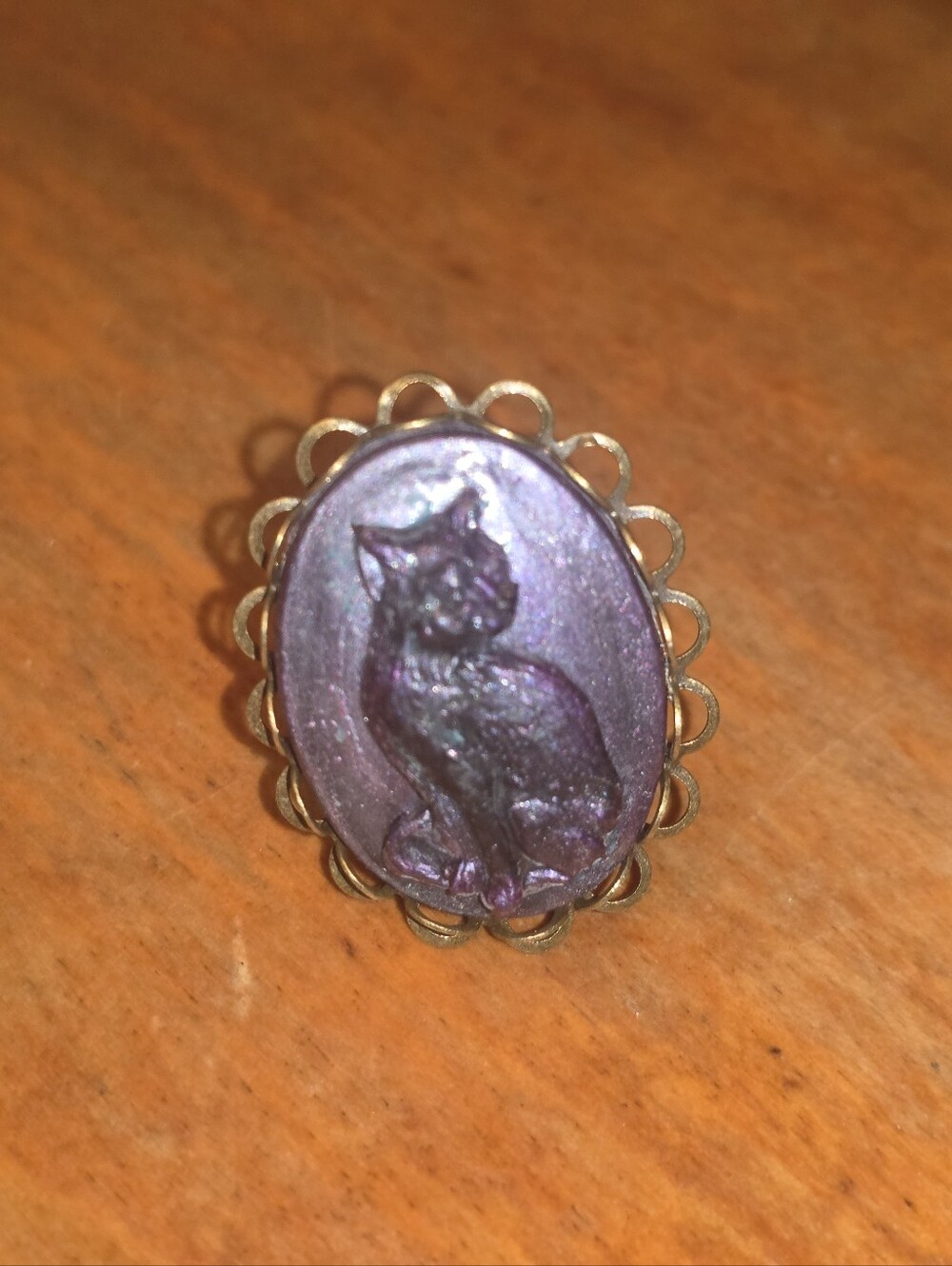 Resin Black Cat Ring On Purple Cabochon In A Bronze Tone Adjustable Frame